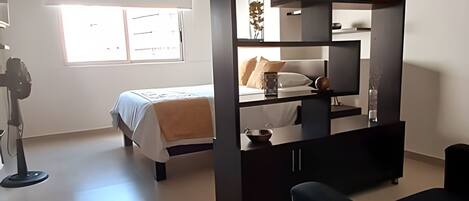 1 غرفة نوم ومكواة/لوح كي وواي فاي وملاءات أسرّة