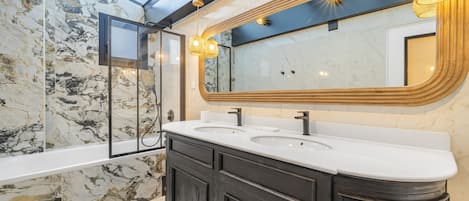 Shower, hair dryer, towels