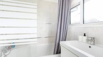 Hair dryer, towels, soap, toilet paper