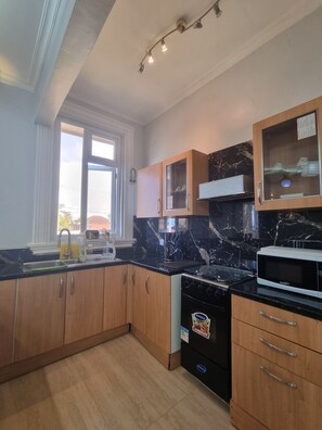 Apartment | Private kitchen | Fridge, microwave, oven, stovetop - Remarkable 2-bed Apartment in Dar es Salaam (Dar es Salaam)