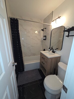 Hair dryer, towels, soap, shampoo