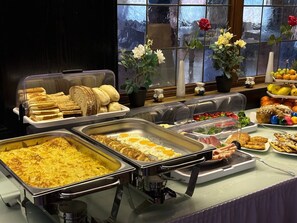 A buffet with various food items, including bread, eggs, and salads. - WG-Hostel (Baiersbronn)