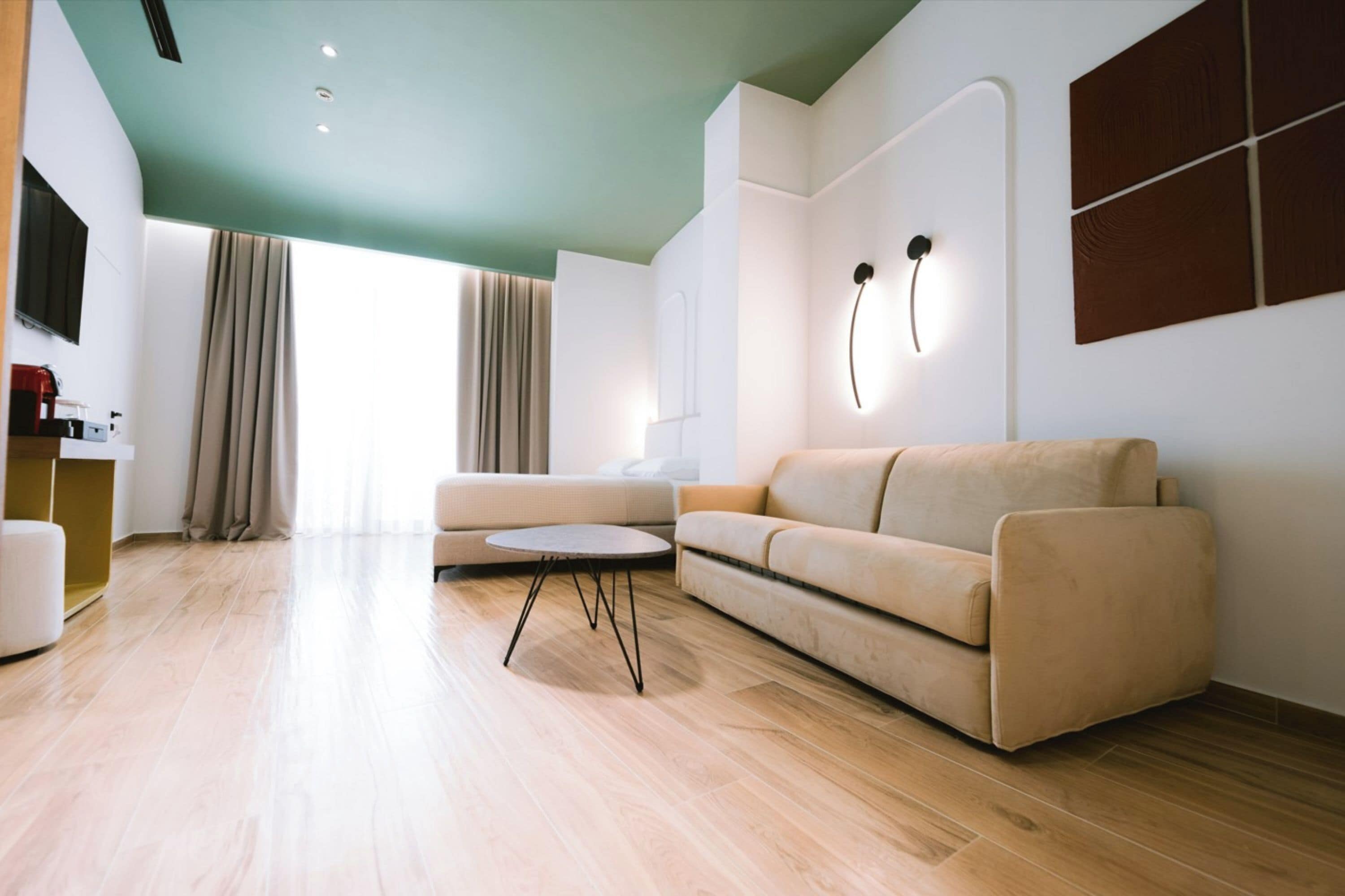 Family Room, Balcony | Living area | 42-inch TV with satellite channels