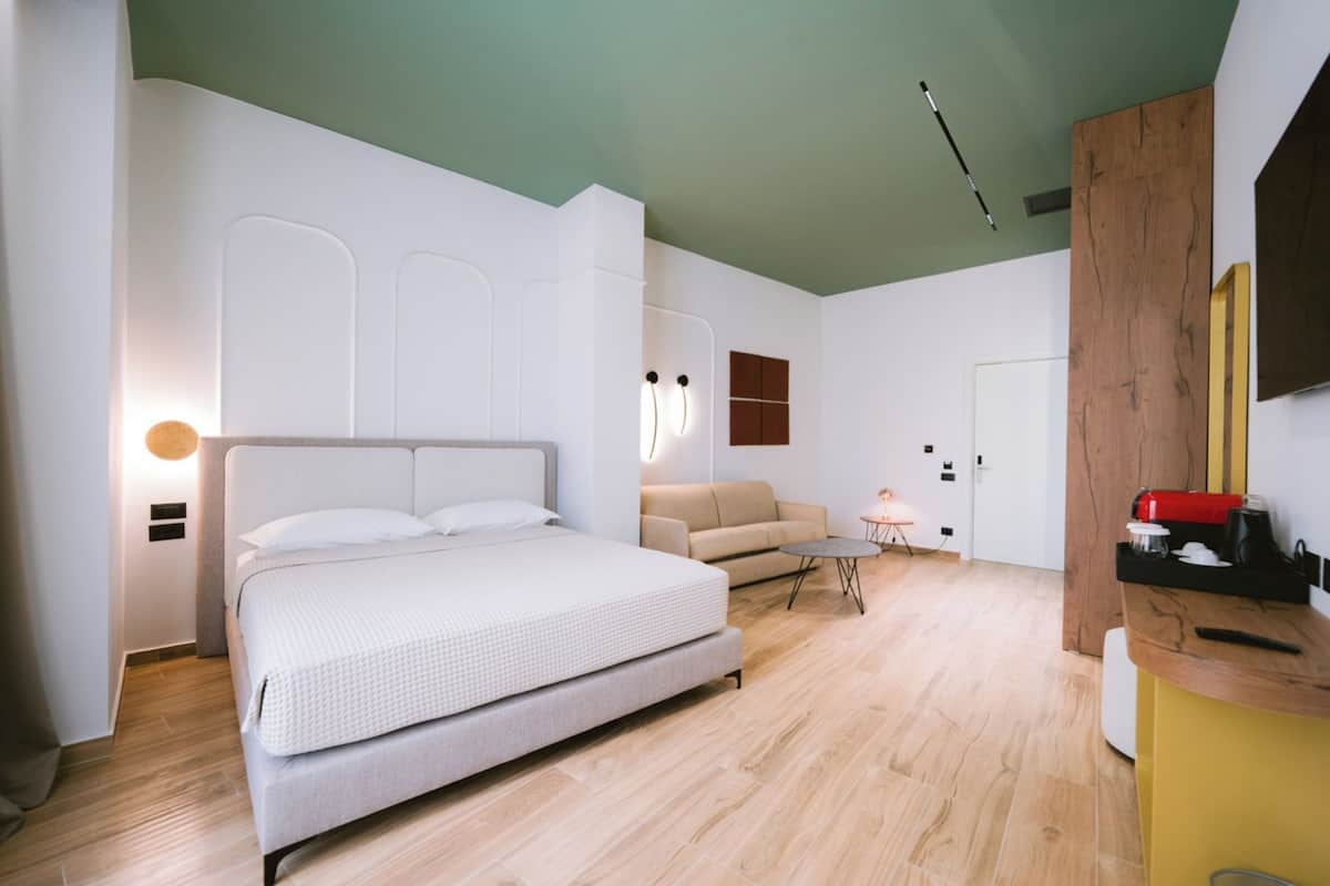 Family Room, Balcony | Minibar, soundproofing, WiFi (free), bed sheets
