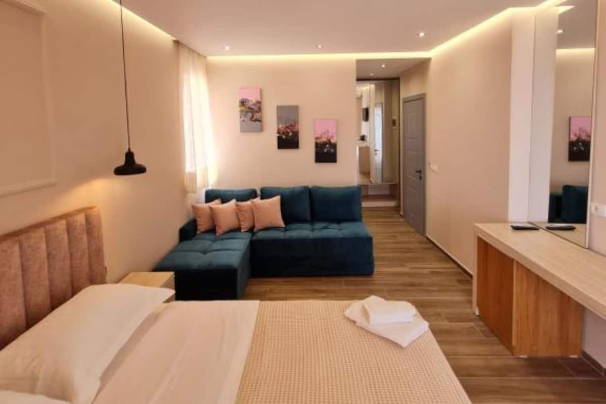 Deluxe suite, uitzicht op zee | 1 slaapkamer, hypoallergeen beddengoed, een kluis op de kamer