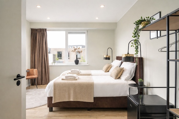 Suite for two with Wifi and airconditioning. Beds can be arranged as 2 singles or double.