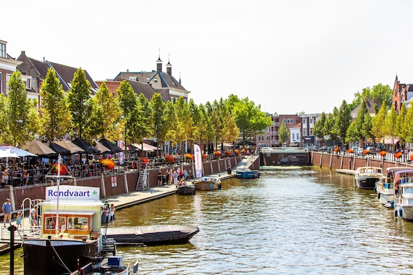 Experience Breda in Brabant, where the canals and waterfront cafés create a relaxed and inviting atmosphere.