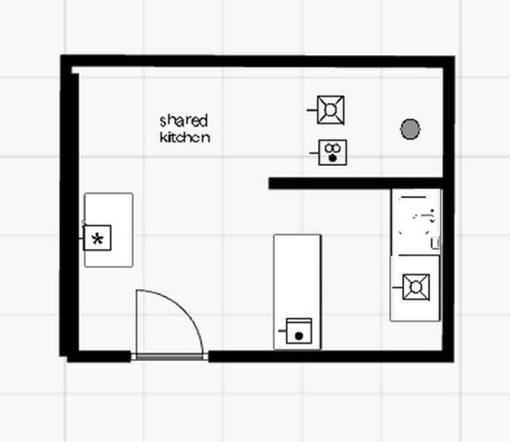 A floor plan showing the layout of the shared kitchen and living space, providing a functional and convenient arrangement.