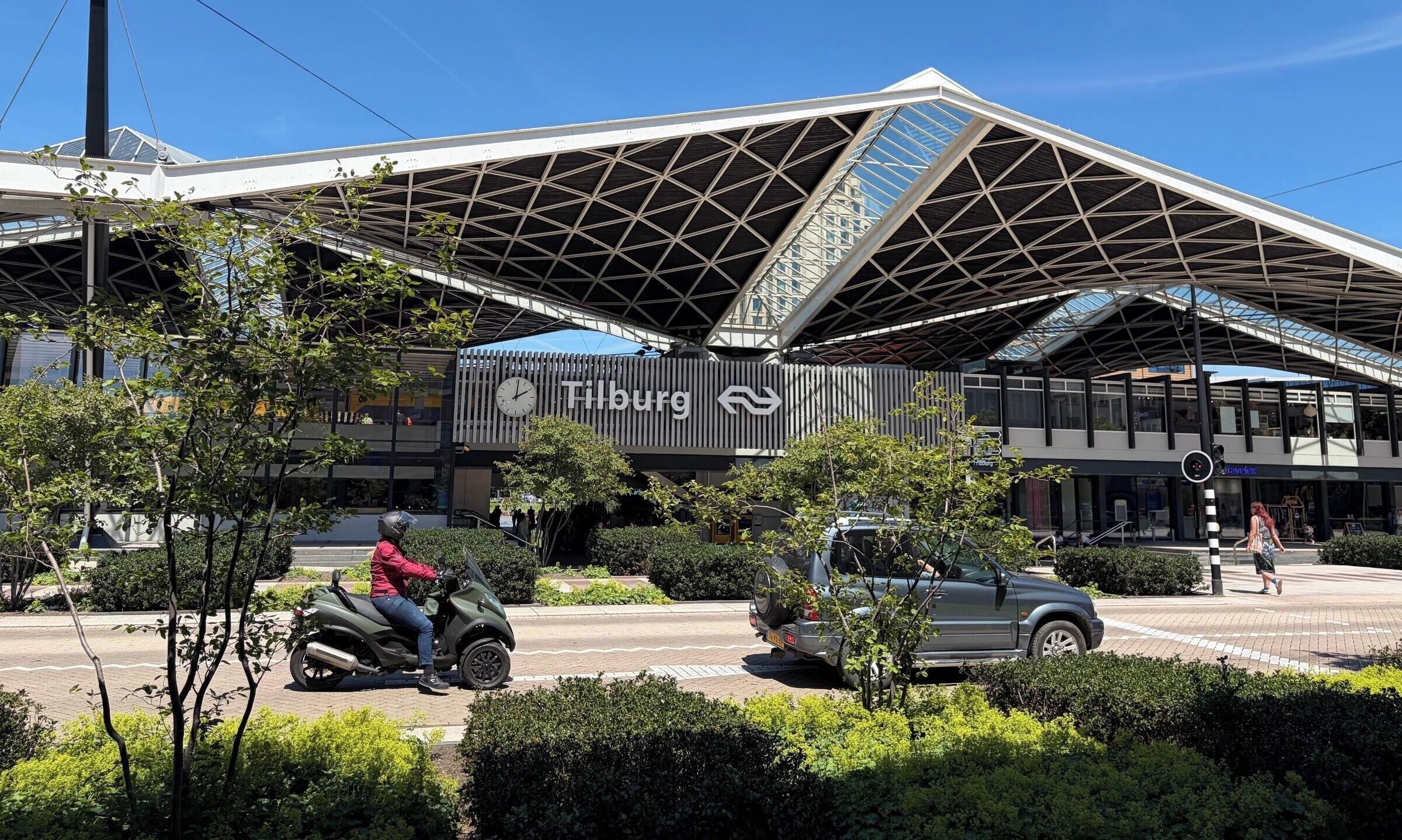A modern building with a prominent sign reading 'Tilburg.'
