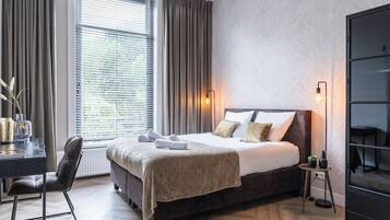 2 slaapkamers, een strijkplank/strijkijzer, gratis wifi, beddengoed