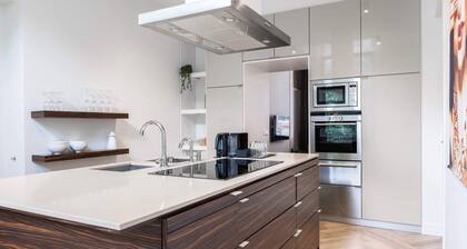 This ground floor apartment features 65m2 of space with a herringbone floor.