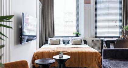 This ground floor apartment features 65m2 of space with a herringbone floor.