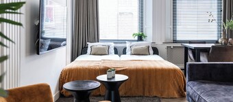 This ground floor apartment features 65m2 of space with a herringbone floor.