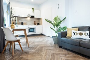 Interior - Contemporary studio featuring a private kitchen, bathroom, and two balconies (Tilburg)