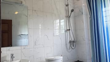 Shower, towels, soap, shampoo