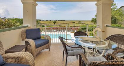 Long distance marsh views and community pool.