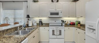 Long distance marsh views and community pool.