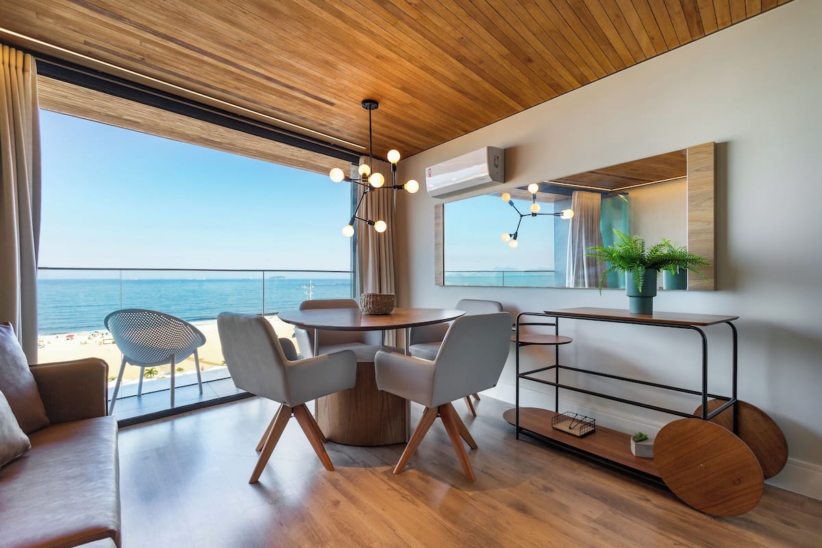 Design Apartment, 2 Bedrooms, Ocean View | Living area | 50-inch LED TV with cable channels