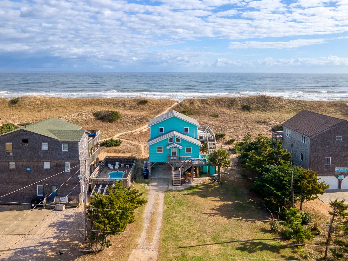 Oceanfront home with views, tiki bar, hot tub just steps to the sand!