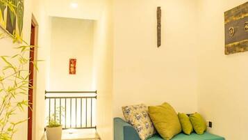 Deluxe Triple Room, Terrace, Hill View | Living area | 32-inch LCD TV with satellite channels