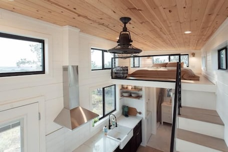 Interior. 2BR Tiny Home Near Palo Pinto Mountains State Park + Sleeps 4 + Firepit