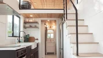 Fridge, stovetop, coffee/tea maker, cookware/dishes/utensils