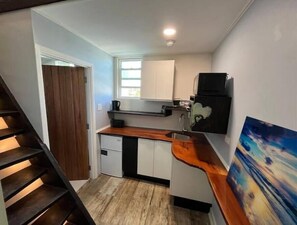Fridge, microwave, stovetop, coffee/tea maker
