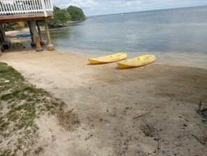 On the beach, sun-loungers, beach towels