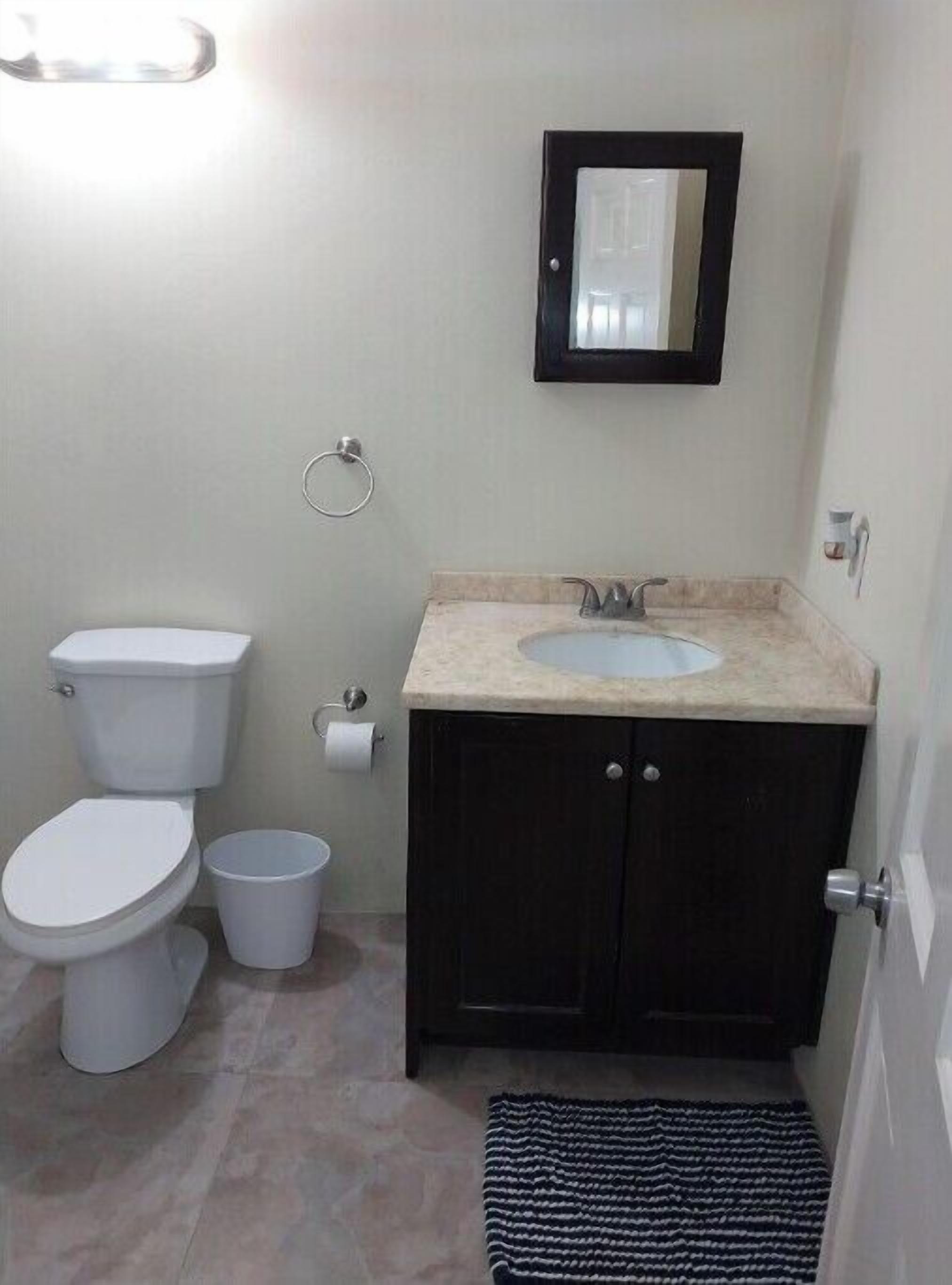 Shower, towels, soap, toilet paper