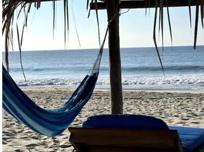 A la platja, gandules de platja i tovalloles de platja
