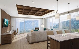 A modern living room with a large window, wooden ceiling, and a dining area.