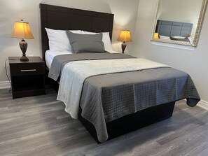 Room, 1 Queen Bed | 1 bedroom, soundproofing, free WiFi, bed sheets