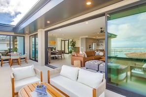 TV, fireplace, table football - Goldenview | 4BR Ocean, City & Bay Escape + Spa (San Diego)