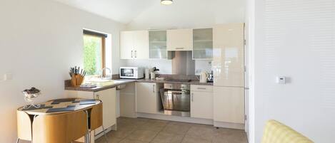 Fridge, microwave, toaster, cookware/dishes/utensils