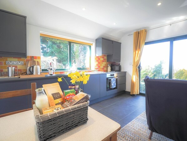 Fridge, microwave, toaster, cookware/dishes/utensils