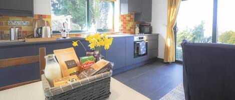 Fridge, microwave, toaster, cookware/dishes/utensils