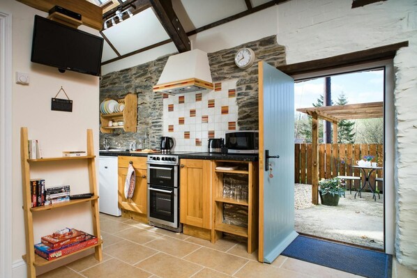 Fridge, microwave, toaster, cookware/dishes/utensils