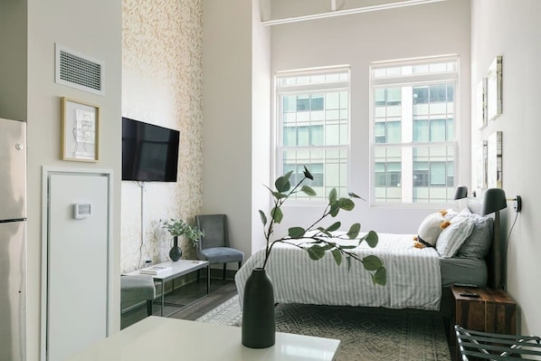 1 dormitorio, tabla de planchar con plancha, cuna de viaje y wifi gratis