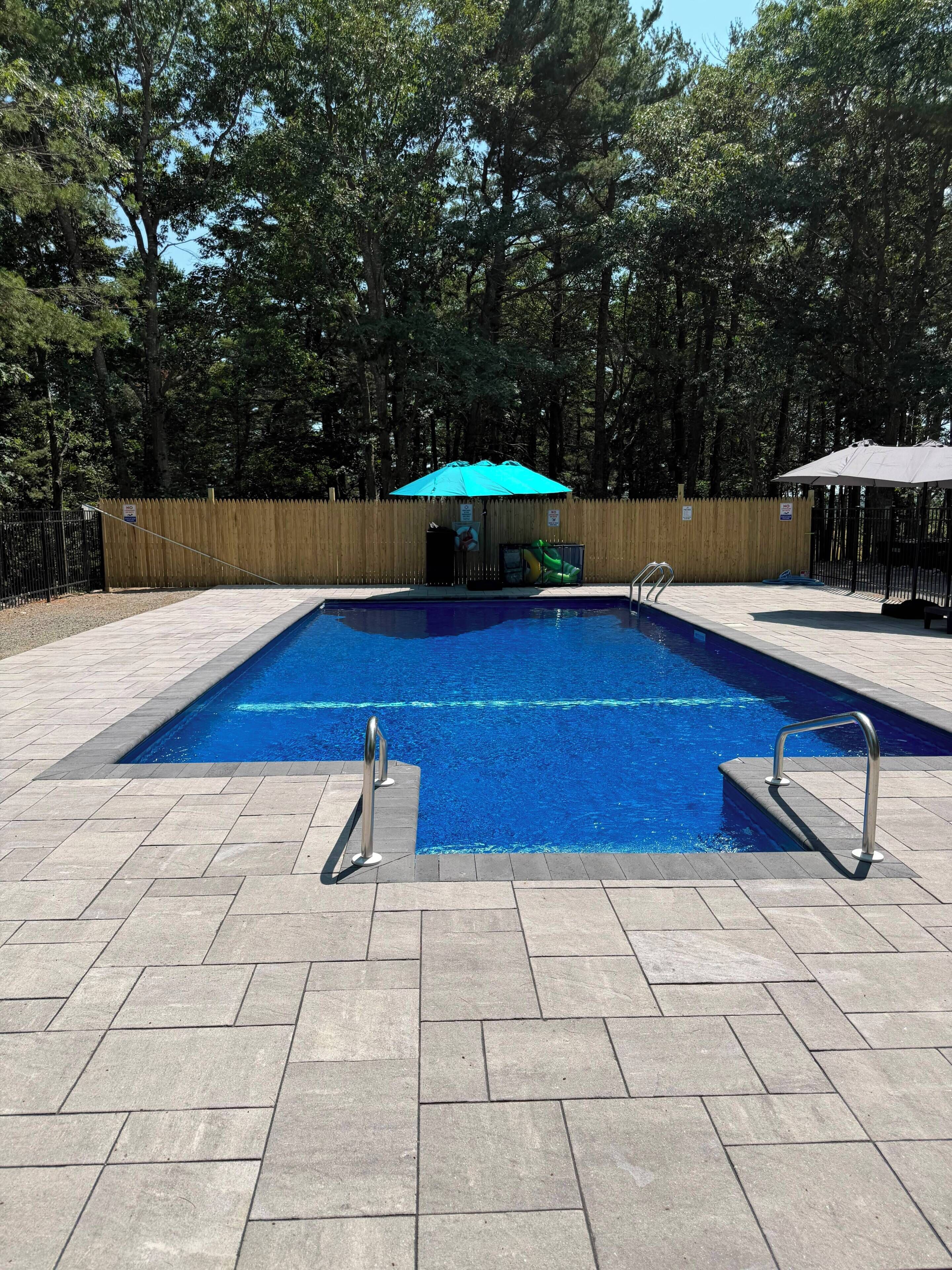 Seasonal outdoor pool, pool umbrellas, pool loungers