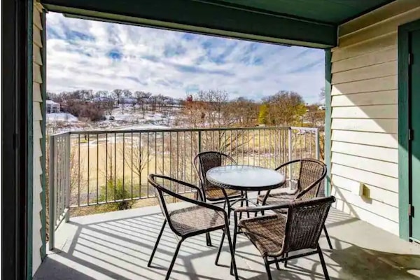 Covered patio with golf course view