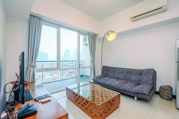 Apartment | Living area - Homey And Warm 1Br Apartment At Ambassade Kuningan (Jakarta)