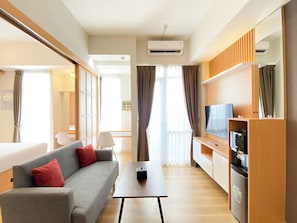 Living area - Best Homey 1Br At 52Th Floor Vasanta Innopark Apartment (Cikarang)