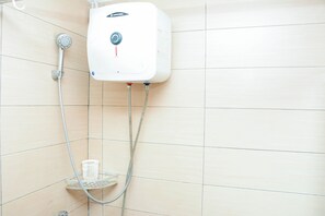 Studio | Bathroom | Shower, towels, soap, shampoo - Strategic And Comfy Studio Apartment At Margonda Residence 5 (Depok)