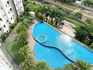 Outdoor pool - Restful And Cozy Studio Apartment At Mustika Golf Residence (Cikarang)