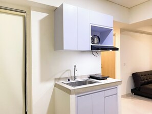 Apartment | Private kitchen | Fridge, stovetop, rice cooker - Comfort 2Br Meikarta Apartment (Cikarang)