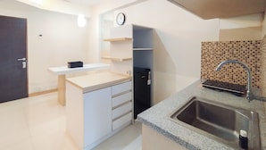 Apartment | Private kitchen | Fridge, stovetop, rice cooker - Best Deal And Comfy 1Br Apartment Gateway Ahmad Yani Cicadas (Bandung)