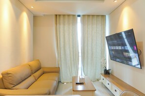 Living area - Nice And Warm 2Br Apartment Casa Grande Residence (Jakarta)