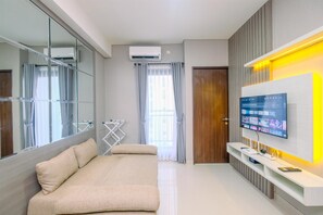 Apartment | Living area - Restful And Homey 2Br At Transpark Cibubur Apartment (Bekasi)