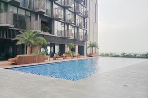 Outdoor pool - Cozy Stay Studio Apartment For 4 Fax Carstensz Residence (Gading Serpong)