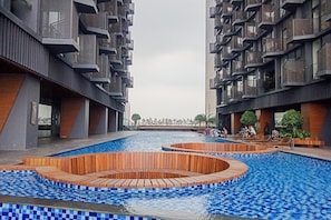 Outdoor pool - Cozy Stay Studio Apartment For 4 Fax Carstensz Residence (Gading Serpong)